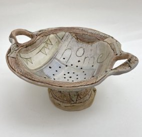 "Home", stoneware colander with porcelain slips and oxides - £170