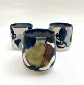 Small porcelain wheel thrown pots with various slips, glazes and oxides - £90/100